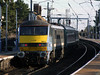 90 013 Tails 1P20 1030 Liverpool St - Norwich is seen catching the light at as departs Manningtree (1133) Friday 6th January 2012
