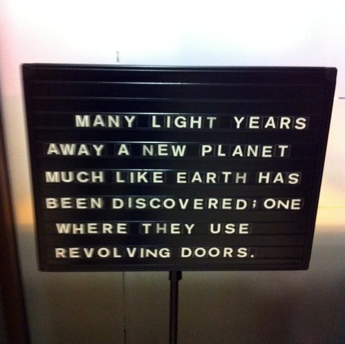 Many light years away a new planet much like each has been discovered; one where they use revolving doors. 