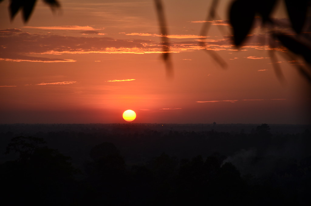 : Sunset over the Cambodian jungle