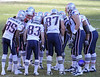 QB Tom Brady leads Offense in the huddle.
