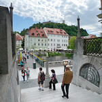 People walking down the Ljubljanica river