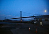 The closed Forth Road Bridge, about to be reopened after dusk on the day of a notable storm.