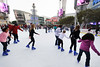Visiting Badger fans join local Los Angeles residents skating at an outdoor ice rink at L.A. Live adjacent to the JW Marriott Hotel in downtown Los Angeles. (Photo by Jeff Miller)