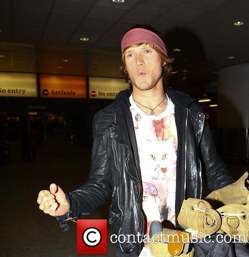 dougie-poynter-arriving-at-heathrow-airport-after_3644873