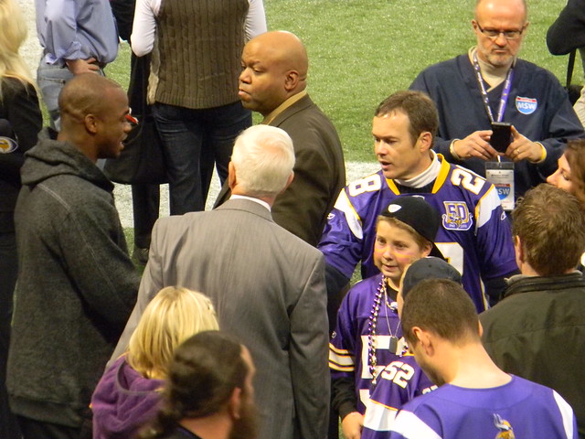 ADRIAN PETERSON meeting some fans before the game