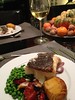 Main course :roast bass, Yukon potatoes, tomatoes & peas with chablis