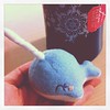 Flight delayed. Killing time with hot tea and baby NARWHAL... hmmm, he needs a name...