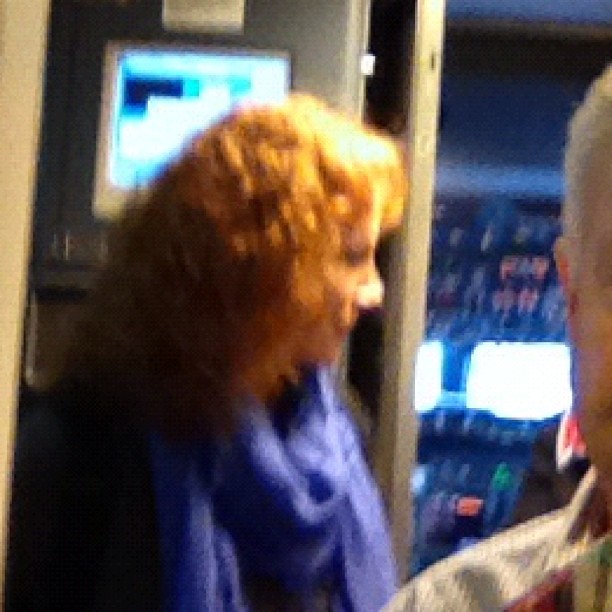 Yes that is a terrible candid photo of REBA MCENTIRE. Sorry Reba you look way more fabulous than this photo allowed!