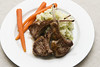 Grilled Baby Lamb Chops with Baby Carrots on Champ