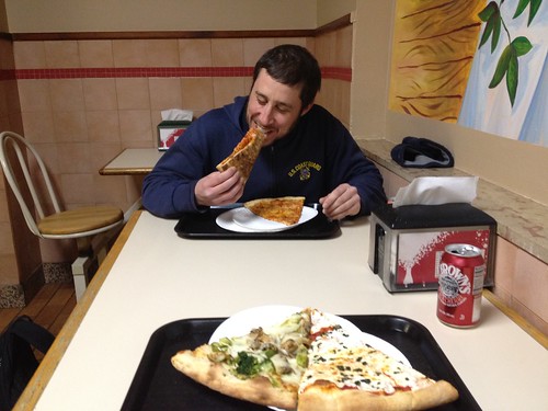 Matt snarfs down some pizza ©  Jason Eppink