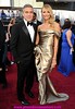 2012 Oscar Dresses-George Clooney and STACY KEIBLER arrive at the 84th Annual Academy Awards in Hollywood, CA.
