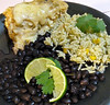 green chile chicken enchilada casserole with cilantro lime rice and black beans