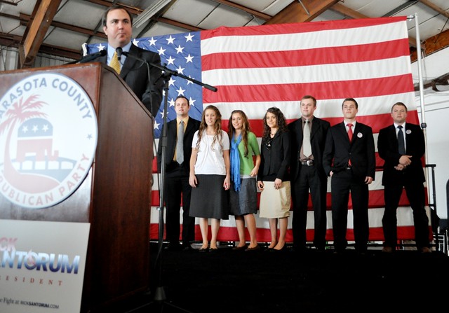 Joe Gruters, Chairman of the Republican Party of Sarasota, Welcomes Supporters as Members of the Duggar Family Look on during Rally for Republican Presidential Candidate Rick Santorum, Sarasota, Fla., Jan. 29, 2012