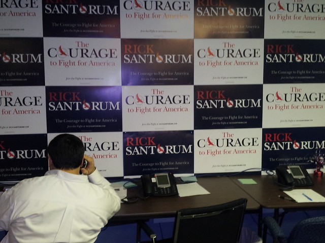 A volunteer works the phones in Rick Santorums office on the eve of the NEW HAMPSHIRE PRIMARY