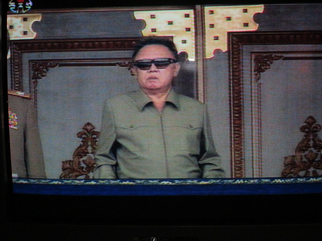 North Korea Pyongyang Central TV broadcast Kim Jong Il watching military parade