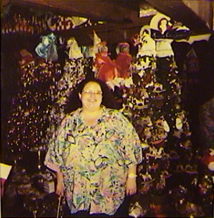 On her birthday, in her elment. Angela Hutchens, my bride at the time, shopping in Disneylands Christmas Shop.