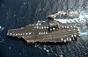 Arabian Gulf ñ May 5, 2006 ñUSS McCampbell (DDG 85) comes alongside USS Ronald Reagan (CVN 76) for a routine fueling at sea (FAS).