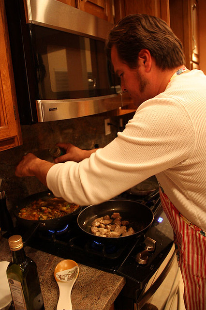 Perfecting his homemade veggie curry.