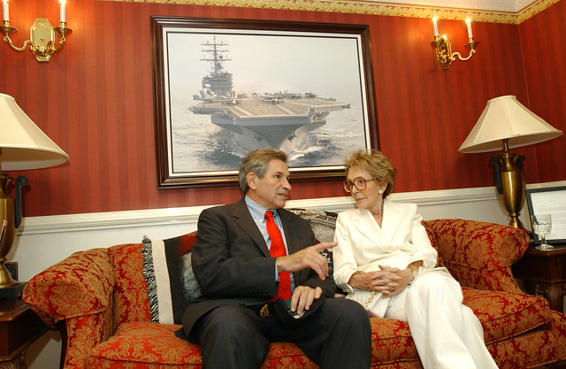 The Honorable Paul D. Wolfowitz, Deputy Secretary of Defense talks to Mrs. Nancy Reagan while in the Captains cabin on 23 July, 2004. Deputy Secretary of Defense. Wolfowitz and Mrs. Nancy Reagan are on the USS RONALD REAGAN (CVN76) for the Homeporting Cer