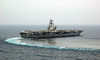 Arabian Gulf - April 14, 2006. 97,000 tons never turned so easily.  USS Ronald Reagan (CVN 76) comes about after she has completed another cycle of flight operations in the Arabian Gulf.