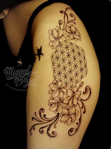 Flower of life delphinium and patterns tattoo