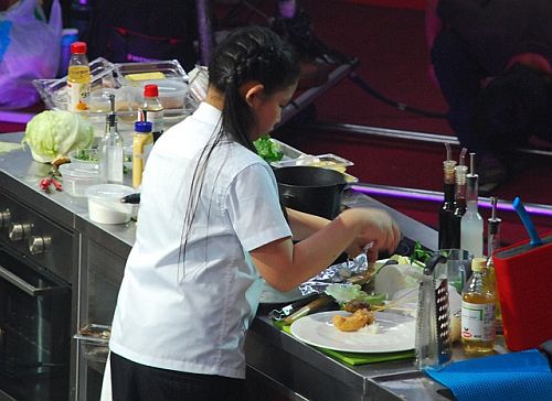 Mika prepares her dream dish, gin-dori in soy mix with seafood furai at the Junior MasterChef Pinoy Edition The Live Cook-off