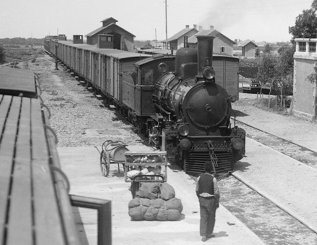 Excellent view of the steam train from Aleppo arriving at the station in the tOWN of  Homs, Syria - circa pre 1946