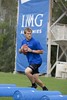 Michigan State QB Kirk Cousins warming up prior to throwing session with IMG Madden Football Academy Director Chris Weinke