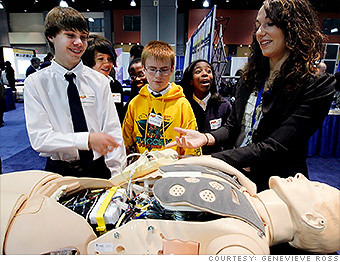 Riyesh Menon: Kids looking at a biomedical engineering product