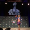 Singer Katy Perry tosses a football at a Super Bowl XLIX press conference. Perry is the Super Bowl halftime performer.