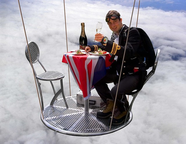 BEAR GRYLLS enjoying a nice meal at 25,000 feet [1600x1237]