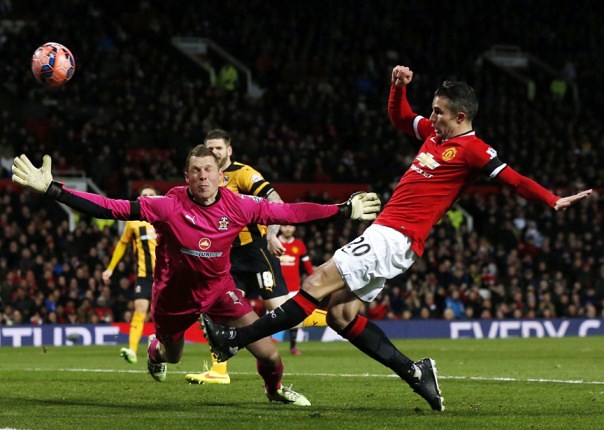 Man United beats 4th tier Cambridge in FA Cup replay