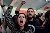Syriza supporters in Athens celebrate historic win