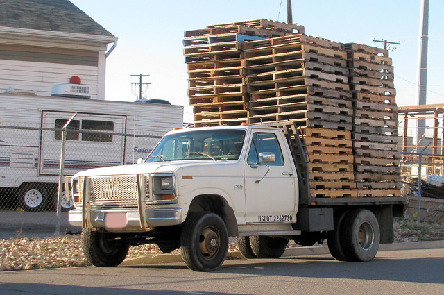 wood old classic ford truck vintage wooden rust 4x4 diesel beefy rusty pickup pickuptruck rusted oxidation vehicle pallet load pallets 1980s stacked loaded beatup beater madeinusa americanmade flatbed rustyandcrusty fourwheeldrive f350 oxidized heavyduty fomoco 1ton worktruck pushbar eyellgeteven