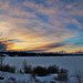 Winter Sunset Over Frozen Reservoir