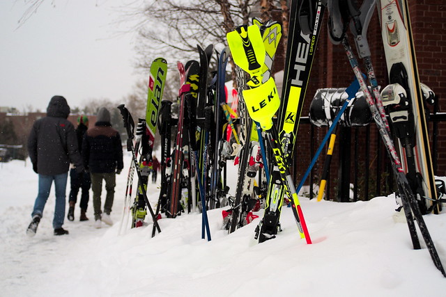 27/01/15 - Medford/Somerville, MA - Students walk by skis jammed into the snow beside Dewick Dining Hall during Winter Storm Juno