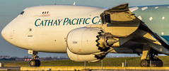 Cathay Pacific cargo in Hongkong Trader livery taxiing to the departure runway • <a style="font-size:0.8em;" href="http://www.flickr.com/photos/125767964@N08/15511072893/" target="_blank">View on Flickr</a>