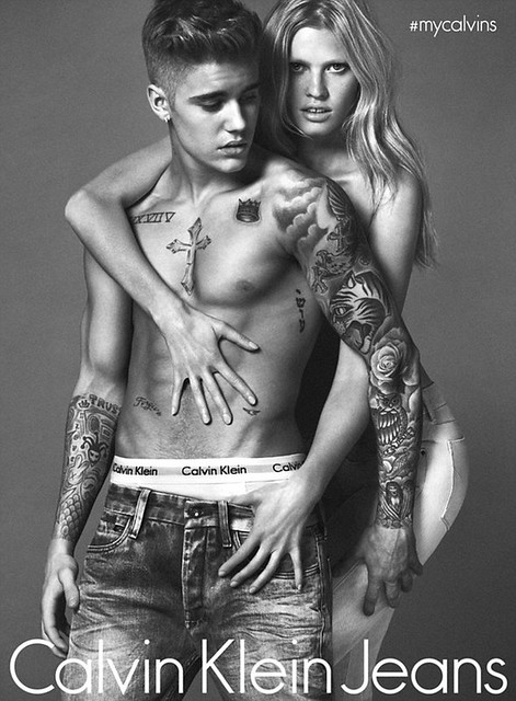 JUSTIN BIEBER has been unveiled as the new face of Calvin Klein underwear. The tattooed 20-year-old singer has posed in a new advert alongside model Lara Stone, wife of comedian David Walliams.