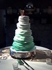 A mint green ruffle wedding cake inspired by the movie UP