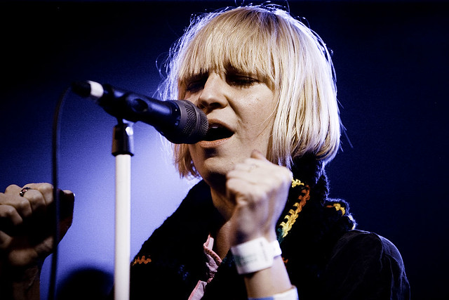1200px-SIA_performing_photograph_by_Kris_Krug