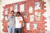 Azlan Zamhari with Premesh at Malaysiakinis News Wall.