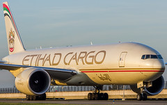 Etihad Boeing 777F taxiing over taxiway Q • <a style="font-size:0.8em;" href="http://www.flickr.com/photos/125767964@N08/15696867450/" target="_blank">View on Flickr</a>