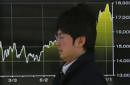 Asian shares tumble as oil gloom deepens