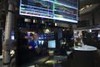 Wall St falls one percent, weighed by commodity stocks