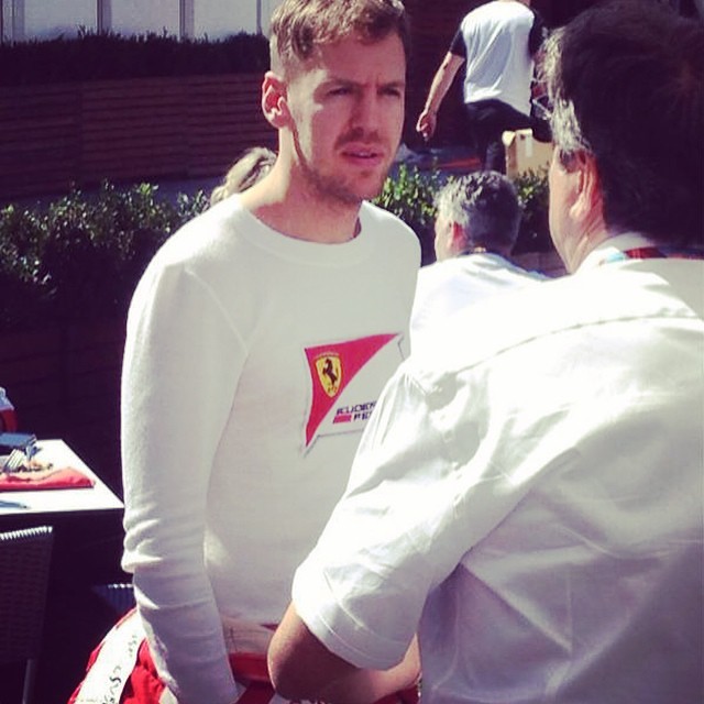 Sebastian Vettel stops to talk to Pasquali #vettel #f1 #ferrari #FerrariF1 #Melbourne #AusGP #Australia #driver #paddock #racing #Saturday #German #italian