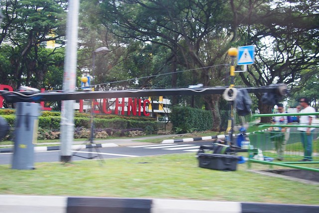 television crew and media setting up shop along the route of Lee Kuan Yews state funeral procession from Parliament House to the University Cultural Centre