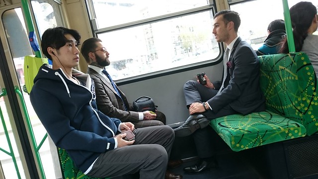 Neckbeard hipster with camera, hipster 2 with Axil Coffee takeaway cup, Asian dude with headphones