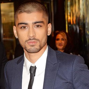 ZAYN MALIK and Louis Tomlinson are fighting on Twitter