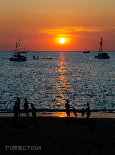 Sunset with yacht and catamaran. Nai Harn beach, Phuket island, Thailand ©  Phuket@photographer.net