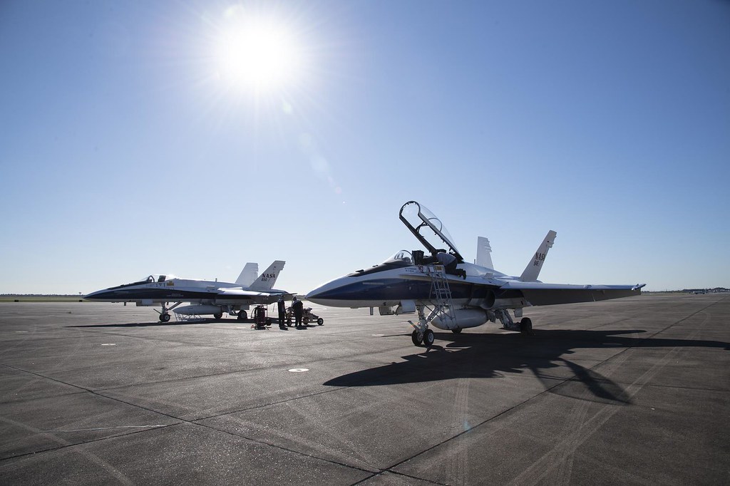 : NASAs McDonnell Douglas (now Boeing) F/A-18 research aircraft stands ready prior to a QSF18 supersonic research flight off the coast of Galveston, Texas.